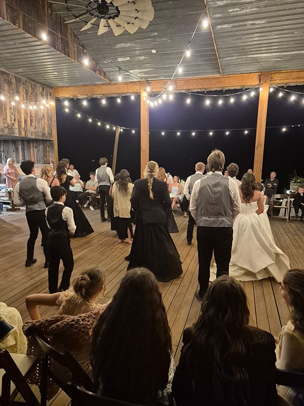 wedding group in Boulder Barn